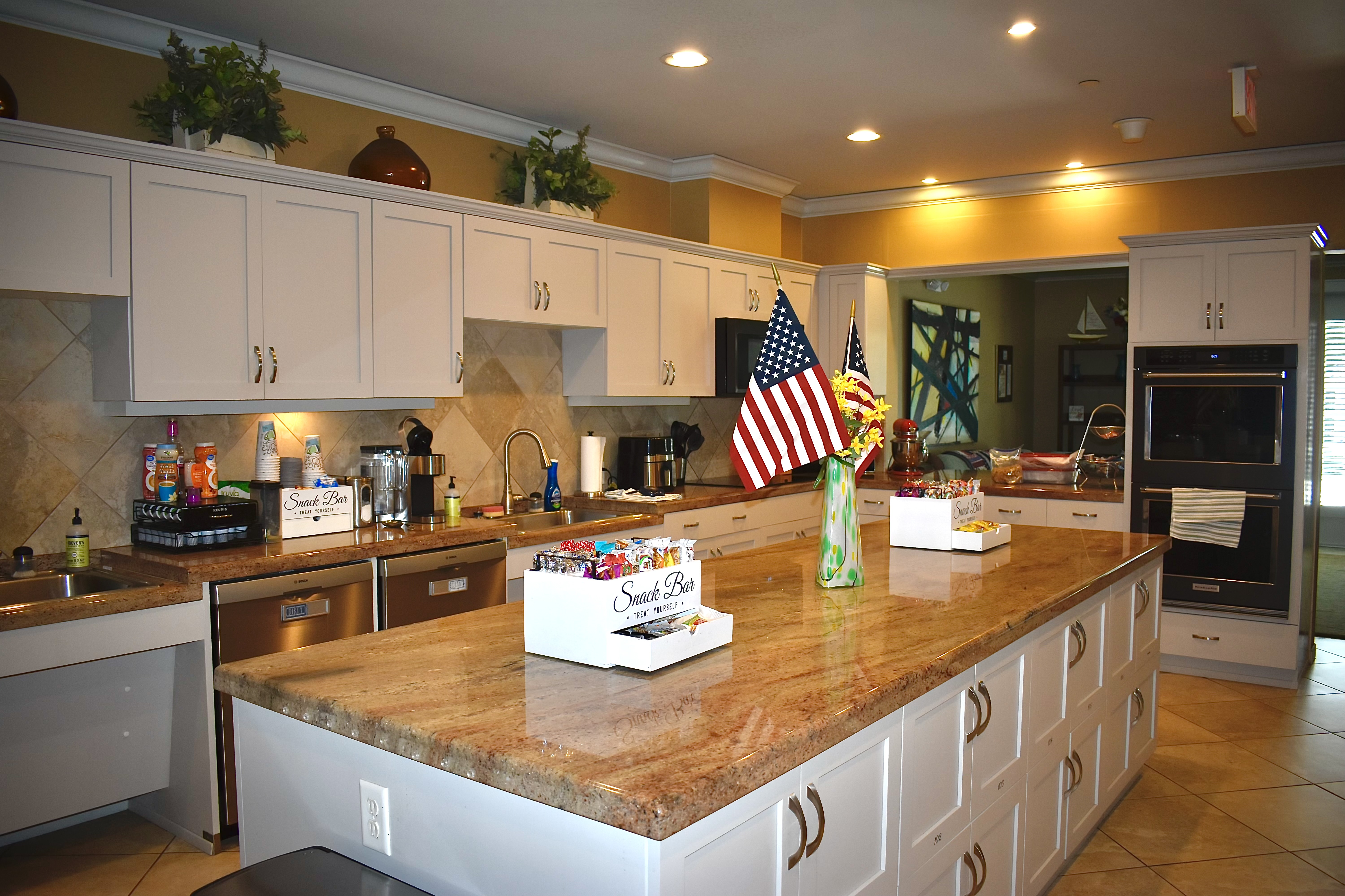 Fisher House shared kitchen with generous counter space and natural light